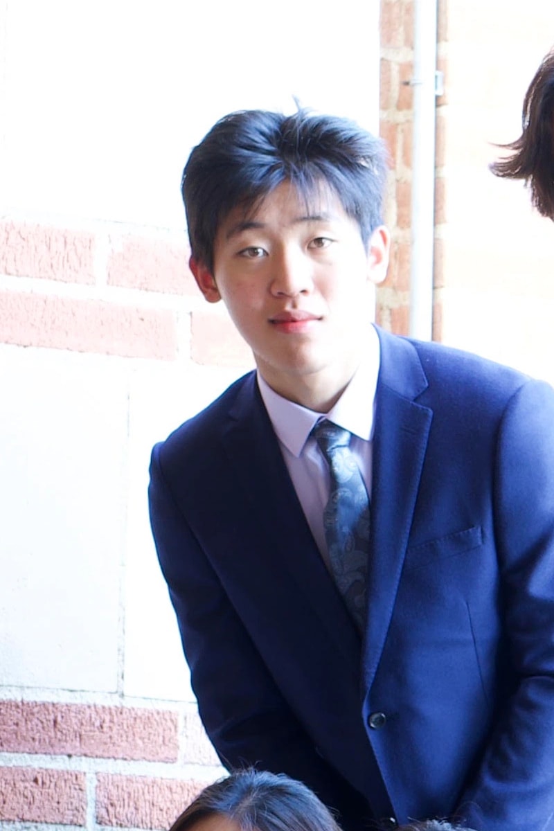 Allen Shan in a blue suit